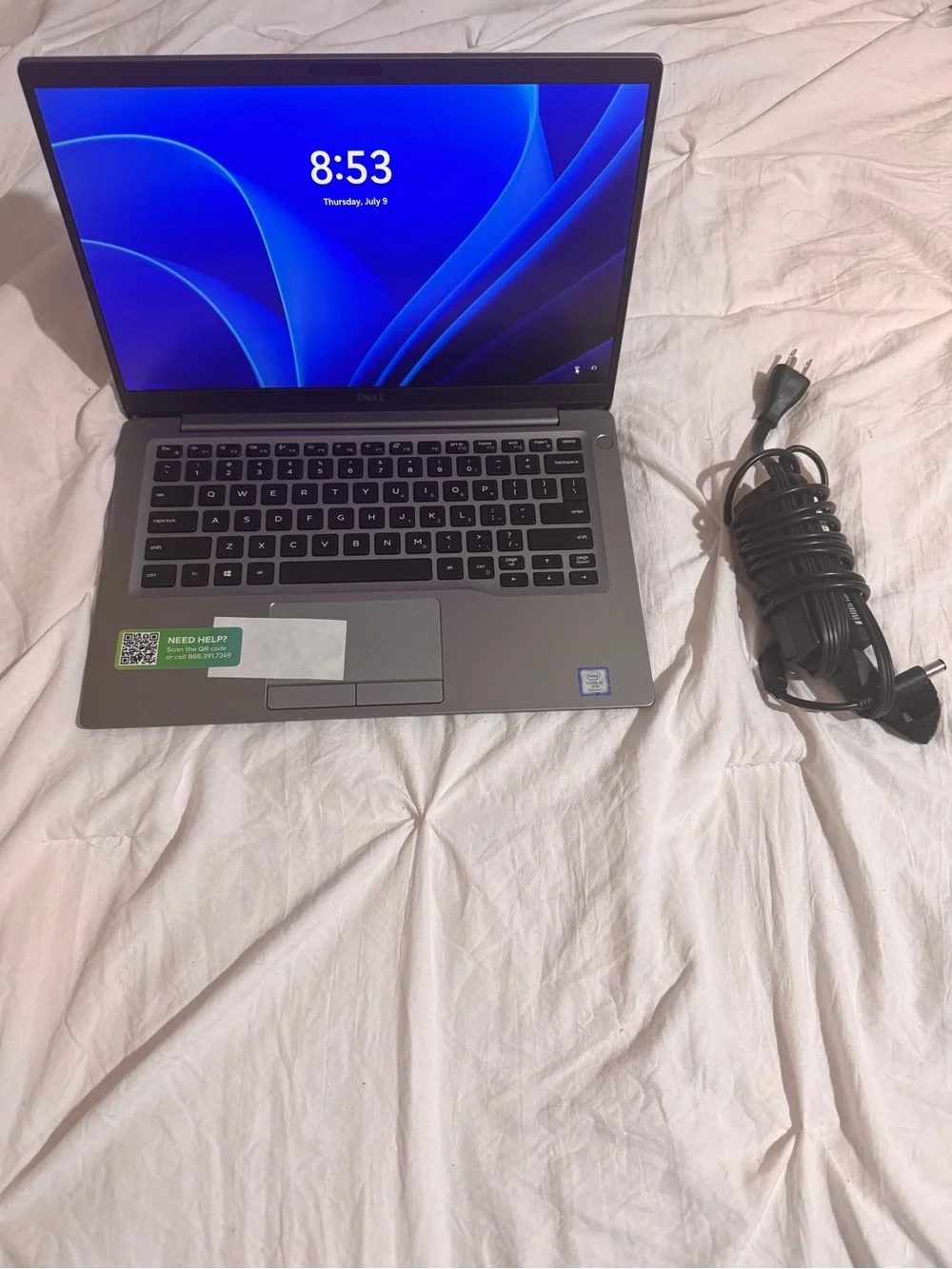 Dell Silver-Gray Laptop with Power Adapter